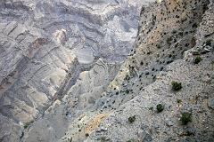 Muscat 07 11 Jebel Shams Canyon Looking Down Jebel Shams is the second deepest canyon in the world after the Grand Canyon in the USA. We walked to the canyon rim and stared over the 2km vertical drop to the bottom of the canyon.